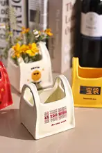 笑顔デザインの陶器製箸立て【持ち手付き・カトラリー収納用】