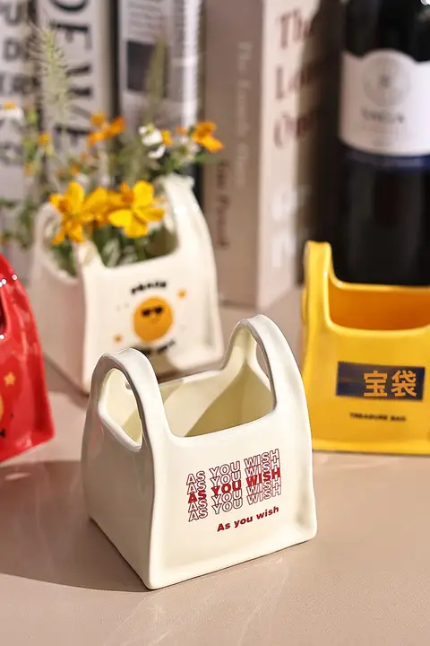 笑顔デザインの陶器製箸立て【持ち手付き・カトラリー収納用】