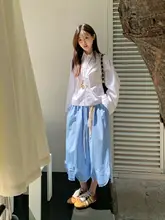 感ある白シャツと花柄ハイウエストスカートのコーディネート（セットアップ対応）