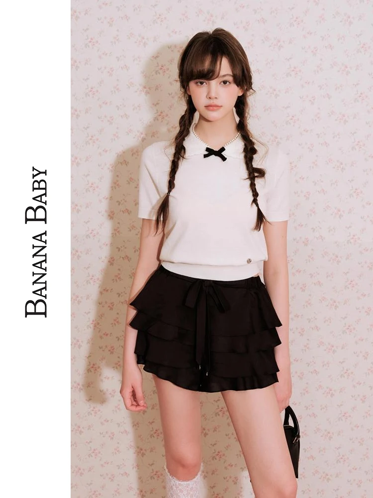可愛らしいデザインのドレスカラー付きニットトップス：リボンと娃娃領が際立つシンプルなファッションアイテム