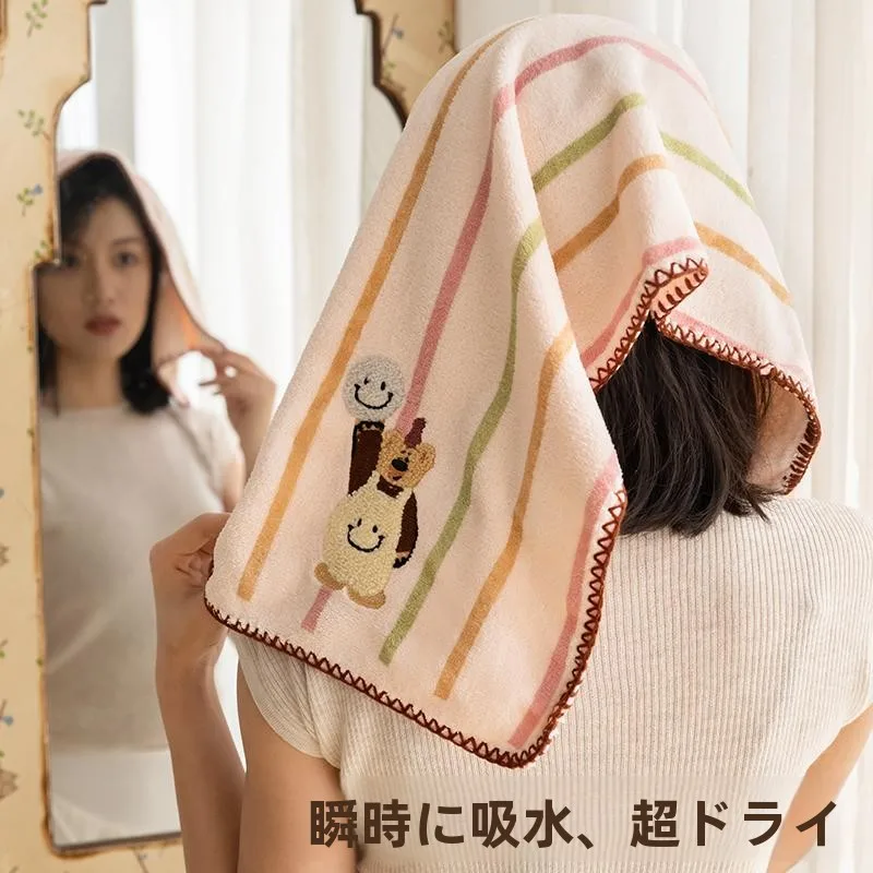 笑顔がかわいいクマ型コーラルシャワータオル：吸水速乾とボーダーデザインの実用性と使い勝手