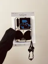 折りたたみ式スマートフォンケース【白地に黒のフラワーパターン・リボン付き・個性的デザイン・対応機種多数】
