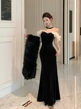 洗練されたデザインの黒いハイネックロングドレス【重工装飾・心機一転】