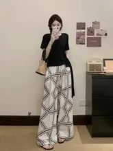 した夏のコーディネートに！デザイン性のある結び付き短袖トップスとユニークなスタイルのワイドパンツ（セットアップ対応）