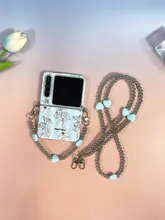 スタイリッシュな青ストライプの花柄折りたたみ式スマホケース【スリングストラップ付き・対応機種多数】（セットアップ対応）