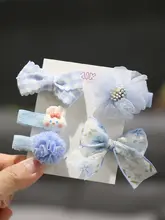 赤ちゃん用リボンヘアクリップ【極上の柔らかさ・全包布・髪を傷めない設計】