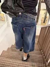 デザイン性の高いハーフ丈デニムパンツ【ユニセックス・ウォッシュ加工・膝上丈】